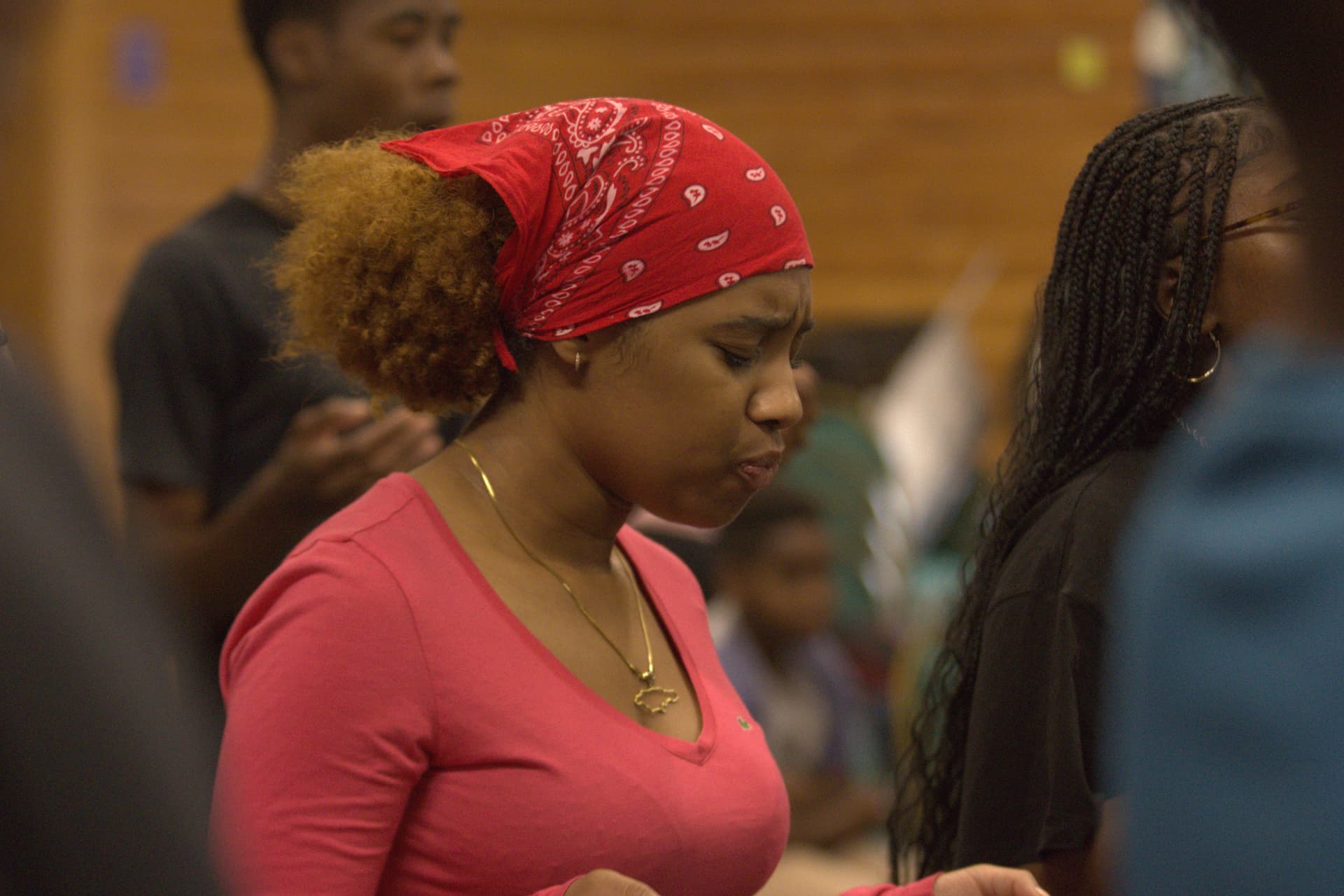 A young person reflecting during a Spark gathering