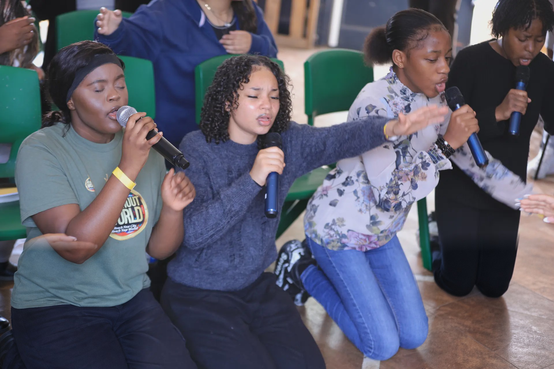 Young people taking part in worship together